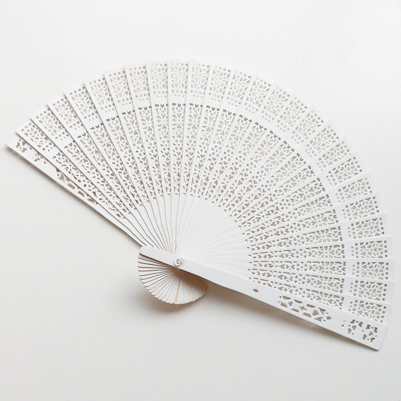 Ladies fan with intricate patterns and elegant laser engraving Bowlift