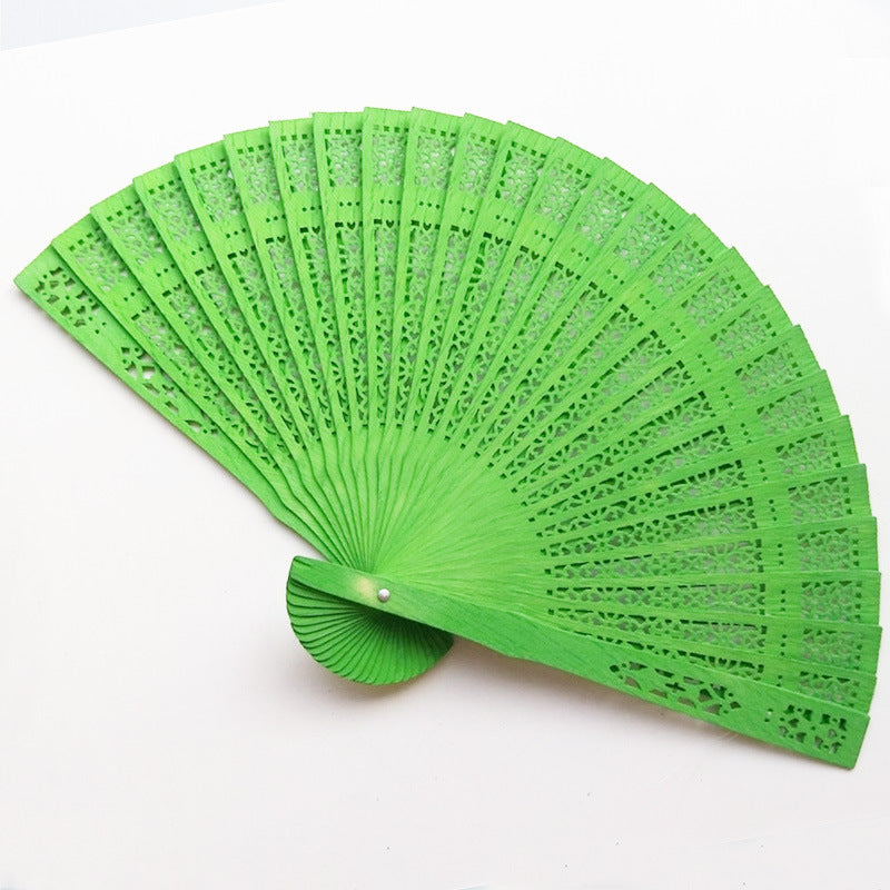 Ladies fine fan made of artistically pierced paper Bowlift