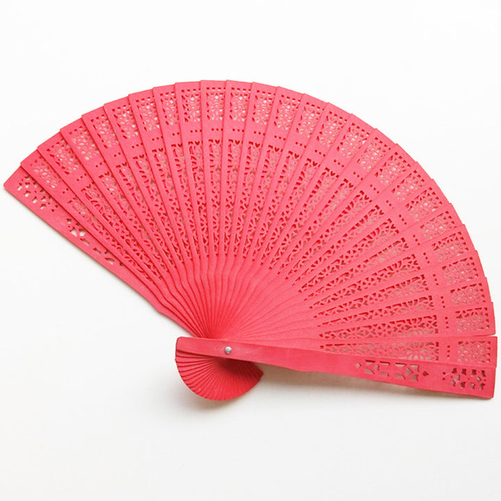 Ladies fan made of delicate plastic with artistic cut pattern Bowlift