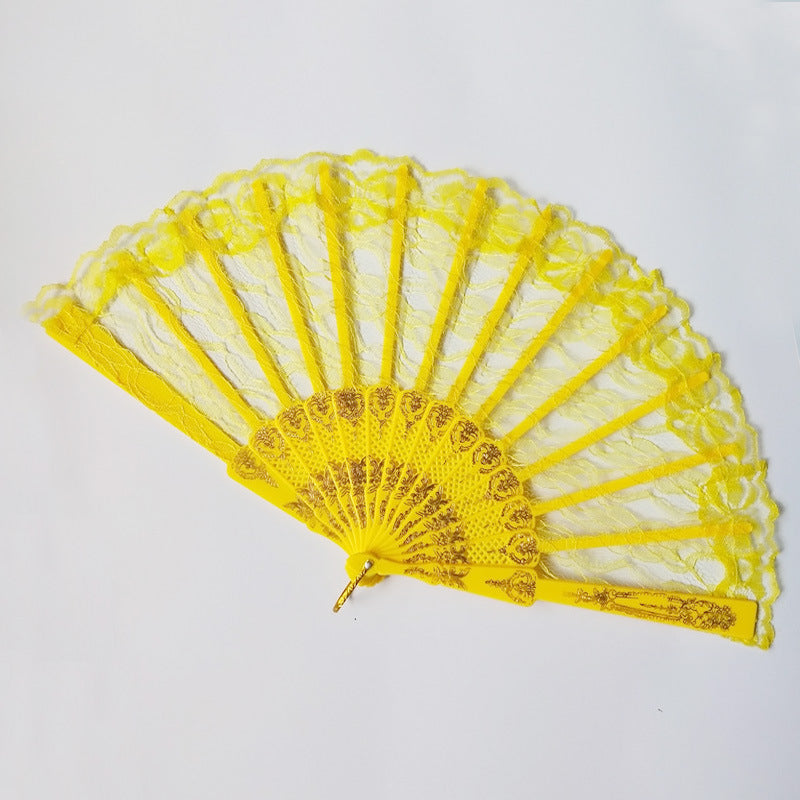 Ladies lace fan with ornate decorations Bowlift