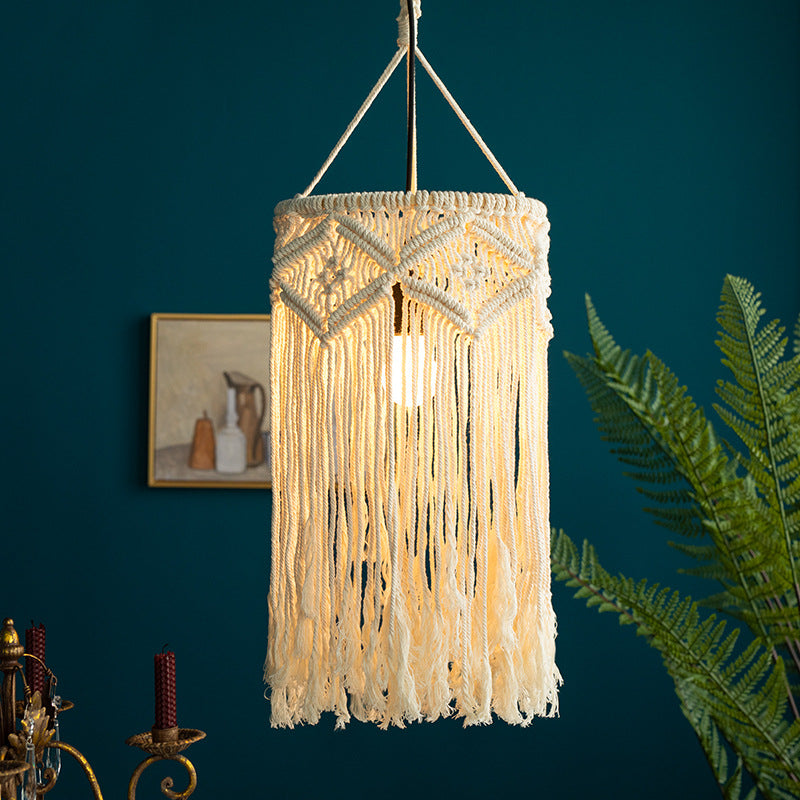 Macramé pendant light with hand-knotted cotton shade and decorative fringes Bowlift