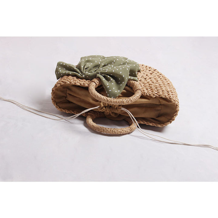 Braided basket bag with decorative scarf Bowlift