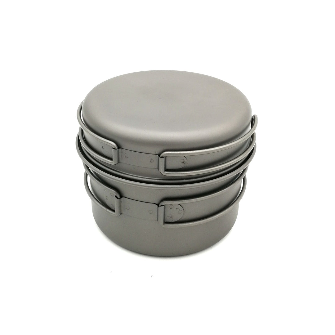 ultra-light titanium backpacking cook set with nesting pots, non-stick finish, foldable handles and compact micro gas burner Bowlift
