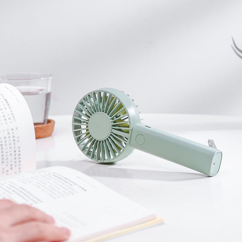 Unisex nan compact portable hand fan with rechargeable battery and USB charging port quiet operation self-standing Bowlift