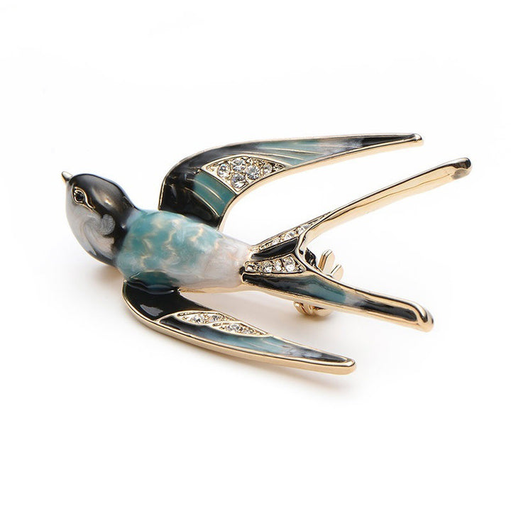 Ornate Bird-Inspired Enamel Brooch Bowlift