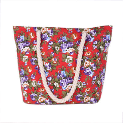 Beach bag with sturdy rope handles and floral details Bowlift