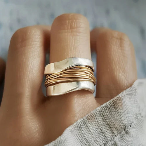 Elegant Silver Ring with Luxurious Gold Accents - Solaira Bowlift