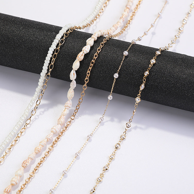 Coastal Shell-Decorated Eyewear Chain Bowlift