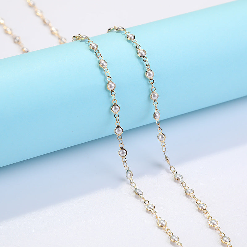 Coastal Shell-Decorated Eyewear Chain Bowlift