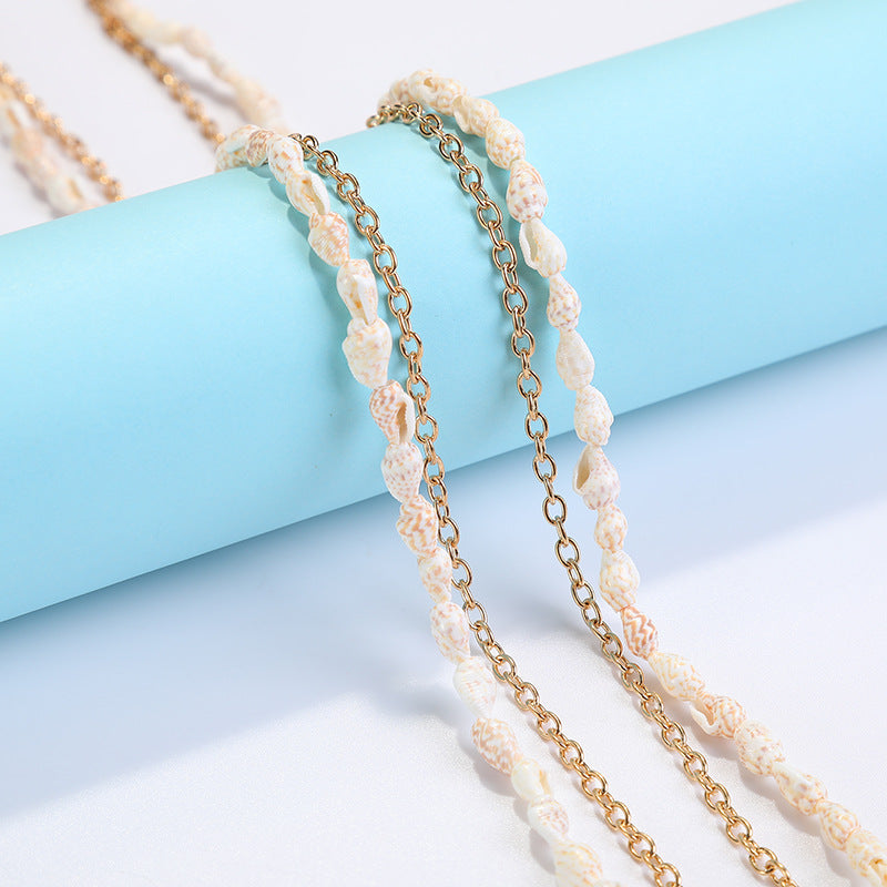 Coastal Shell-Decorated Eyewear Chain Bowlift