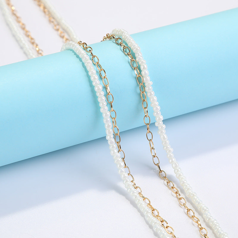 Coastal Shell-Decorated Eyewear Chain Bowlift
