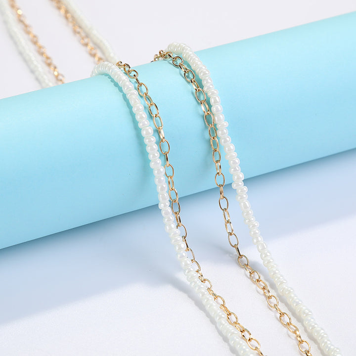 Coastal Shell-Decorated Eyewear Chain Bowlift