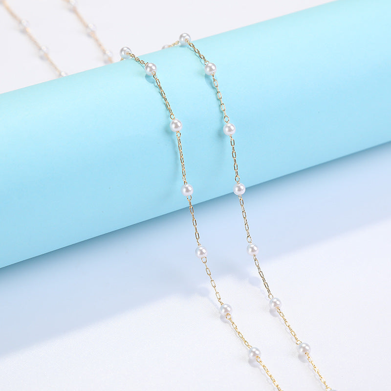 Coastal Shell-Decorated Eyewear Chain Bowlift