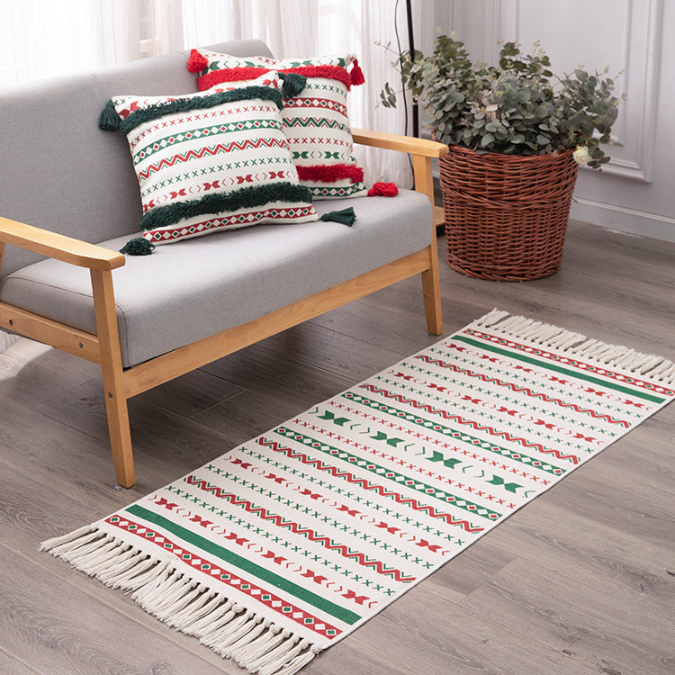 Flat-woven runner rug with Nordic Christmas pattern, tassels and cotton blend Bowlift