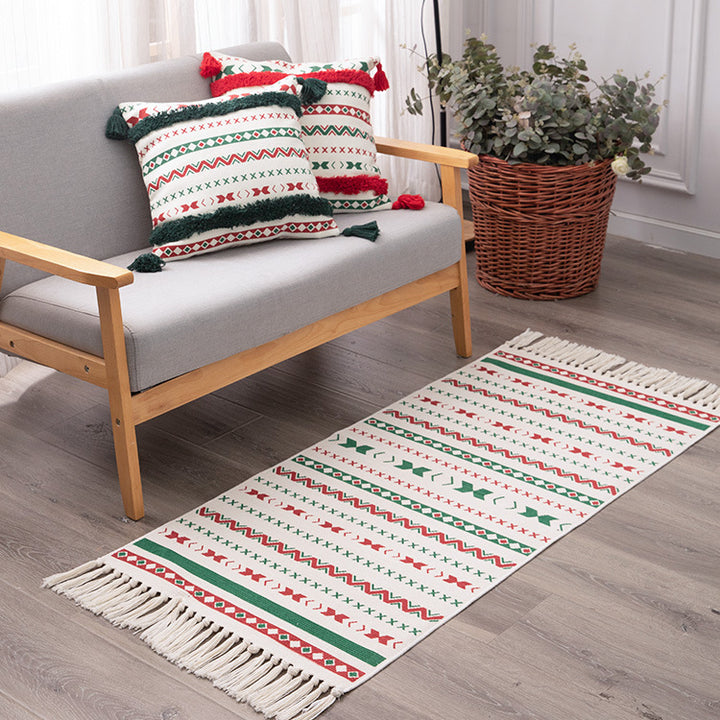 Flat-woven runner rug with Nordic Christmas pattern, tassels and cotton blend Bowlift