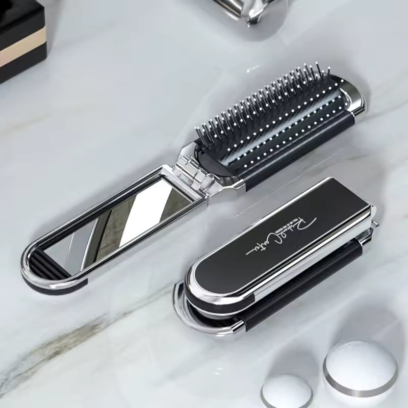 Compact hairbrush with integrated mirror | Bowlift