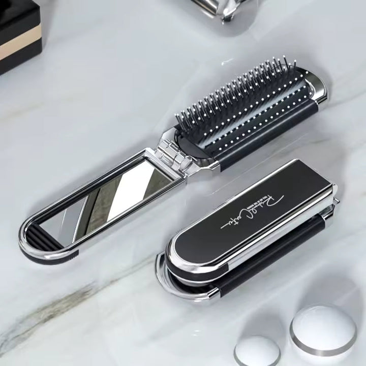 Compact hairbrush with integrated mirror | Bowlift