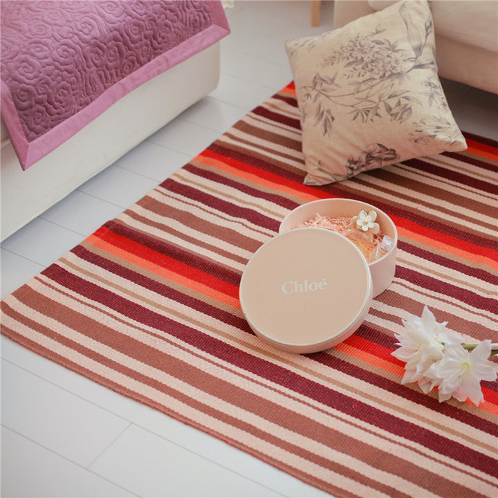 Flat-woven living and bedroom carpet with striped structure and anti-slip backing