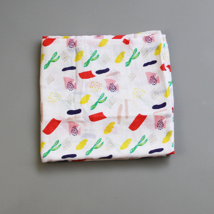 Organic Cotton Dinosaur Print Muslin Swaddle Bowlift