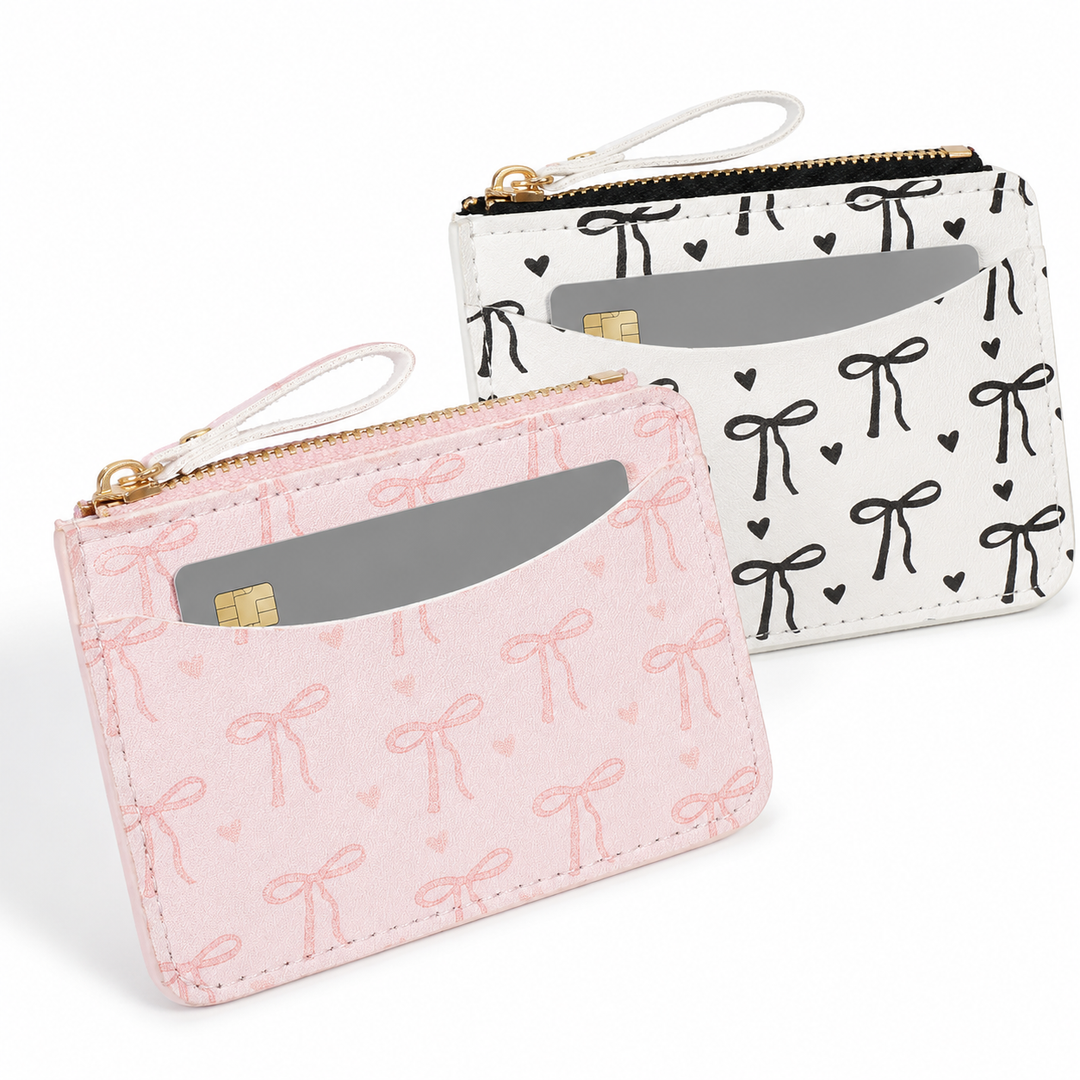Compact bow-print coin purse wristlet with zipper closure Bowlift