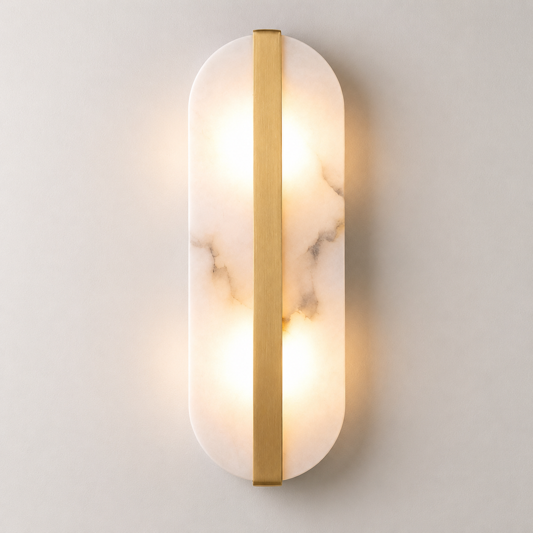 Modern marble oval wall sconce with brass accent and dual pin lamp holders Bowlift