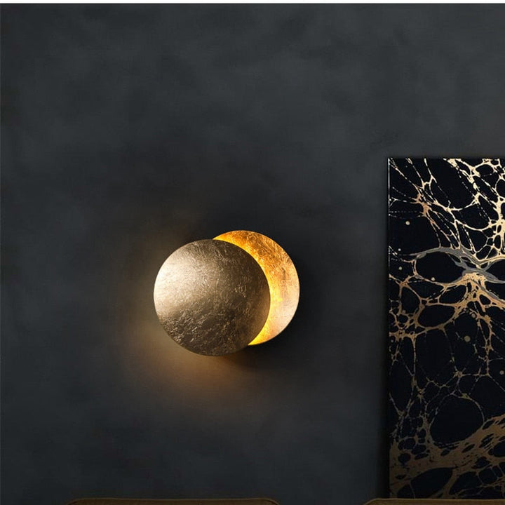 BowLift | Eclipse lamp | Wall light with rotatable golden discs