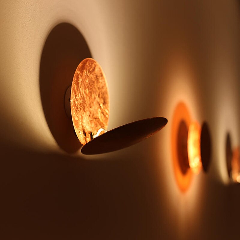 BowLift | Eclipse lamp | Wall light with rotatable golden discs
