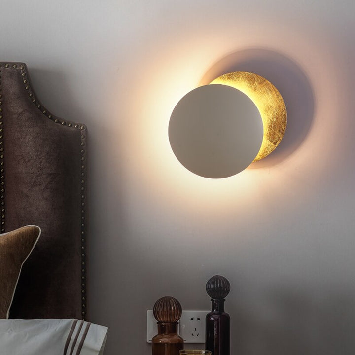 BowLift | Eclipse lamp | Wall light with rotatable golden discs