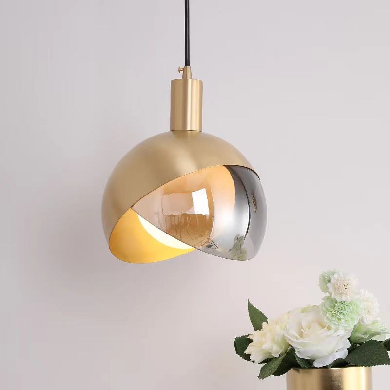 BowLift | Elegant pendant light made of gold glass for dining room