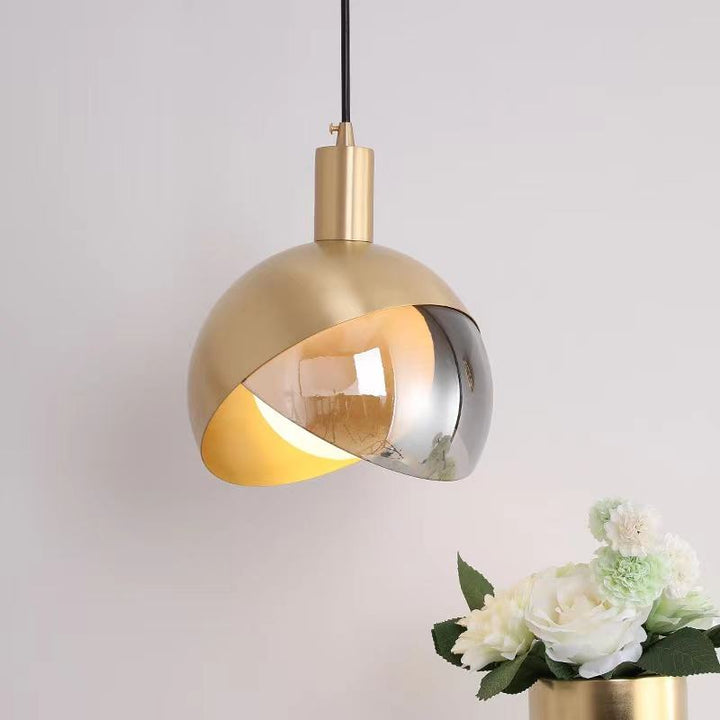 BowLift | Elegant pendant light made of gold glass for dining room