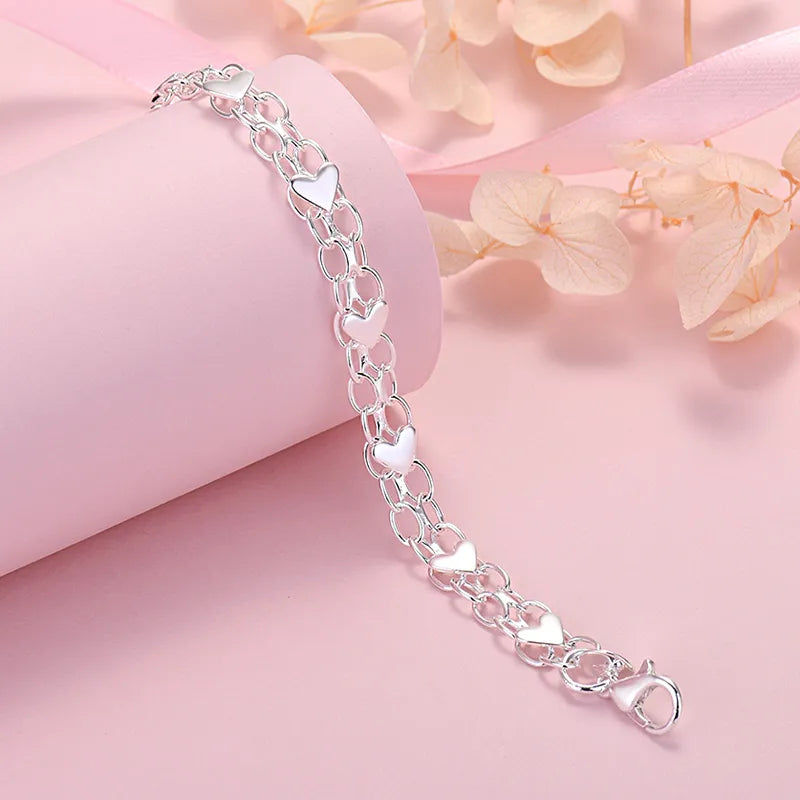 Elegant Luxury Silver Heart Bracelet – Timeless and Chic Bowlift