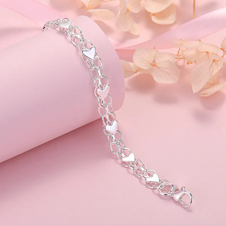 Elegant Luxury Silver Heart Bracelet – Timeless and Chic Bowlift