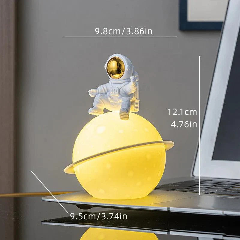 BowLift | AstroLume Astronaut Sculpture with Planet Night Light | Modern Decorative Highlight | Environmentally Friendly PVC & ABS | 9.8 x 12.1 cm