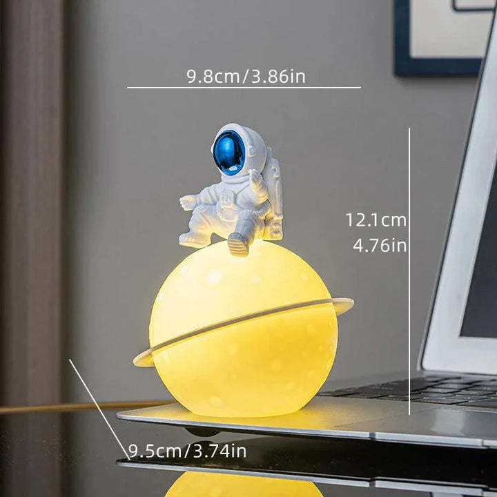 BowLift | AstroLume Astronaut Sculpture with Planet Night Light | Modern Decorative Highlight | Environmentally Friendly PVC & ABS | 9.8 x 12.1 cm
