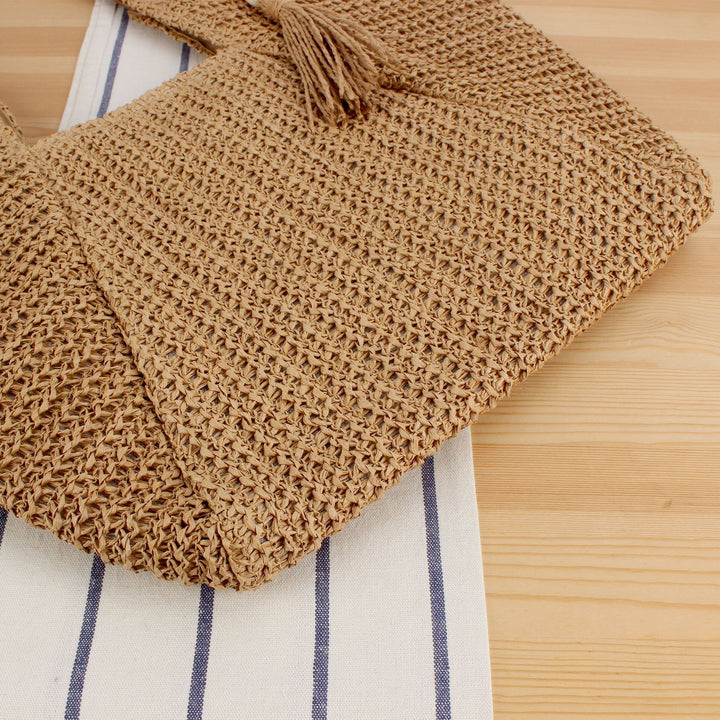 Handbag Made of Handwoven Raffia with Elegant Leather Accents Bowlift