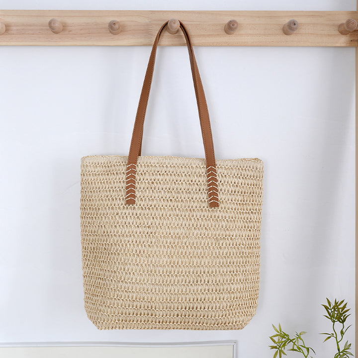 Spacious wicker tote bag with sturdy leather handles Bowlift