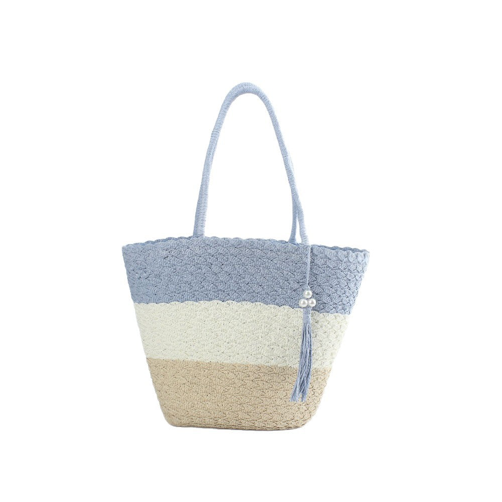 Fashionable crochet shoulder bag with tassel Bowlift