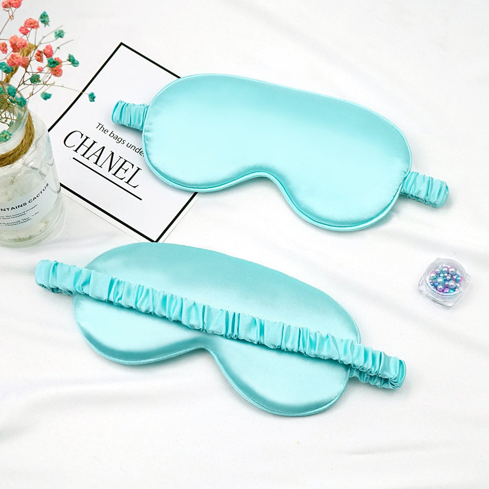 Women's breathable satin eye mask with ergonomic curvature, soft padding and gathered anti-slip band Bowlift