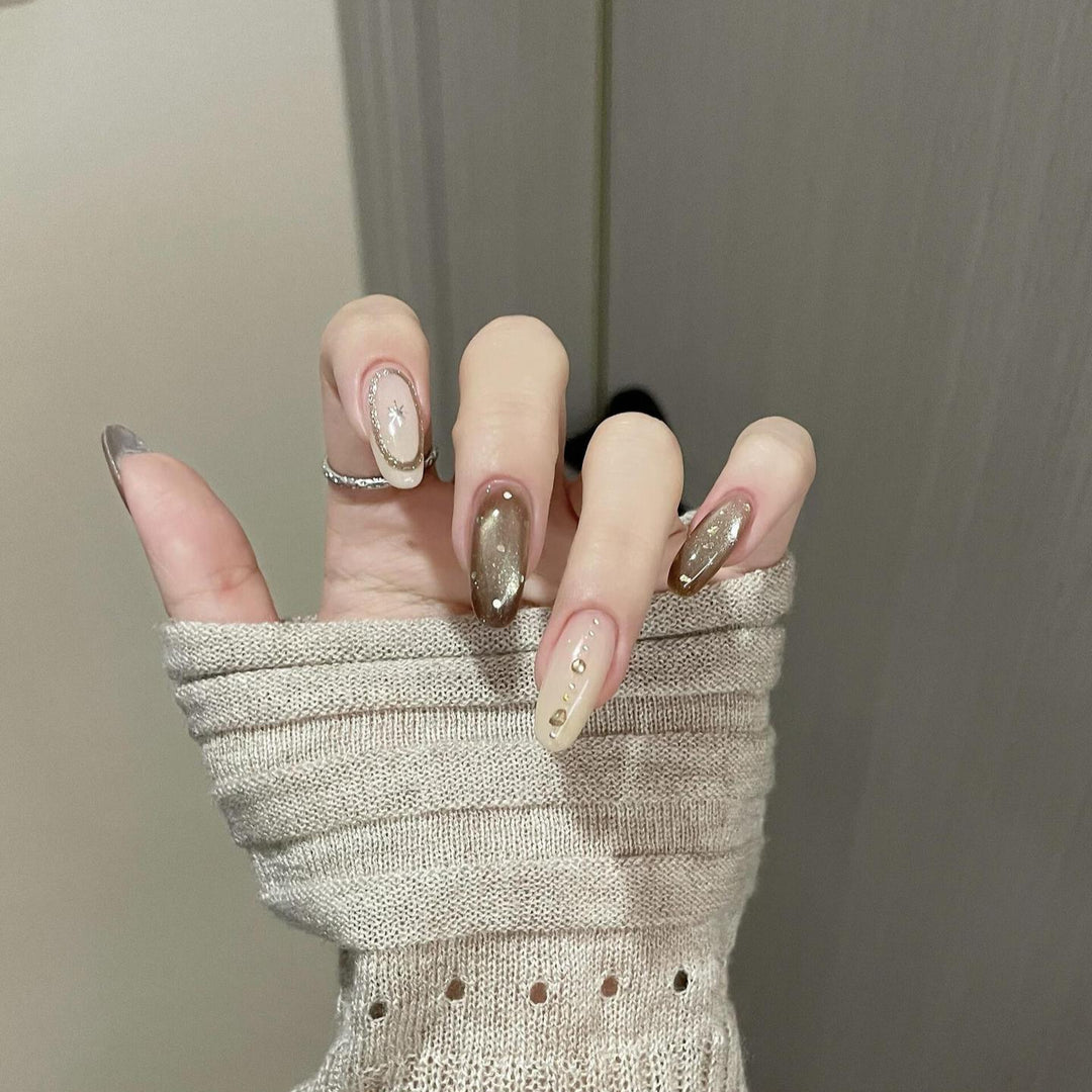 Artificial nails with glitter and star design Bowlift
