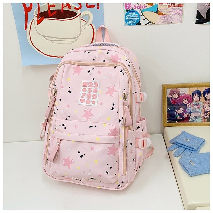 Playful backpack with star motifs and practical functions Bowlift