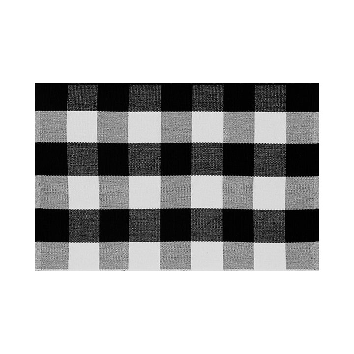 Woven colorful table runner with fringes and checkered structure