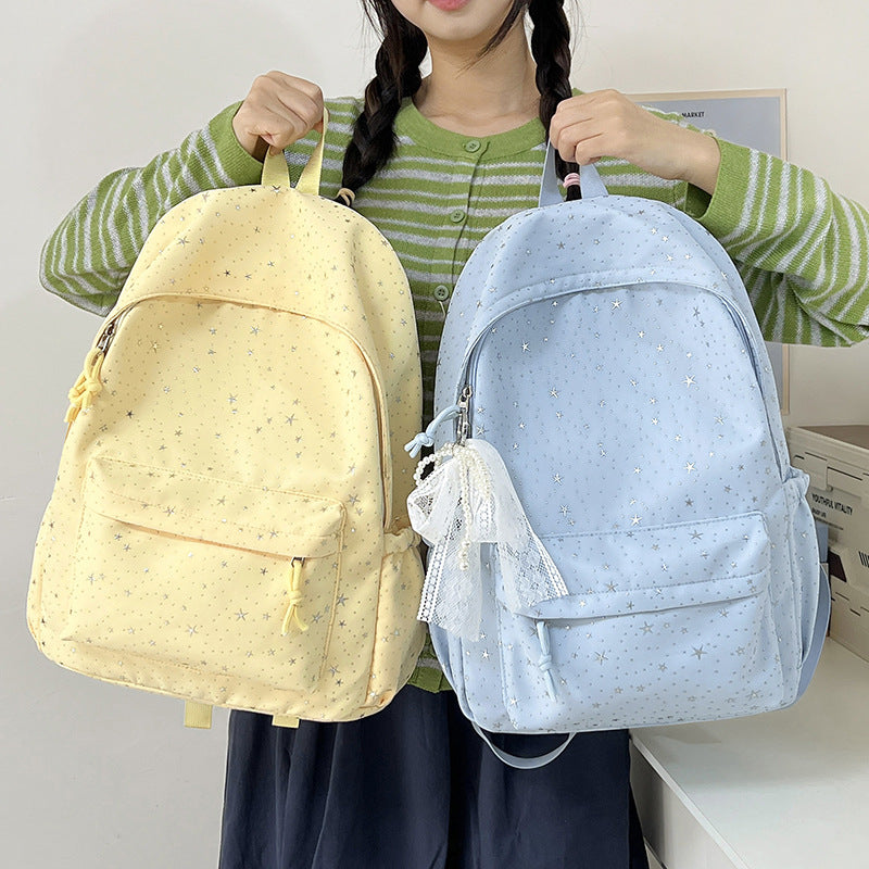 Elegant backpack with glittering stars and practical compartments Bowlift
