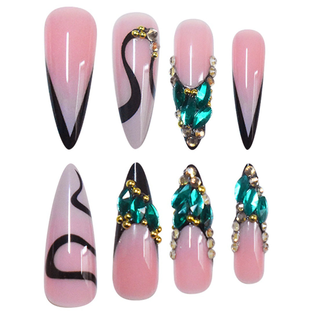 Artistic Stiletto Press-On Nail Art with Gemstone Accents Bowlift