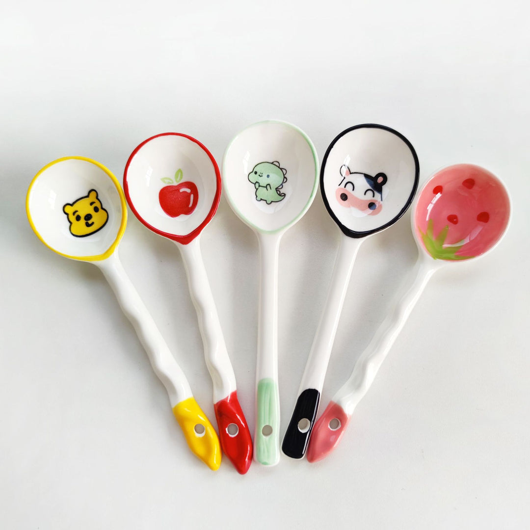 Ceramic soup spoon with lucky cat illustration and ergonomic long-handle Bowlift