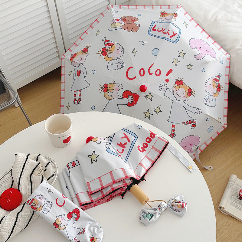 Ladies folding umbrella with playful children's motif Bowlift