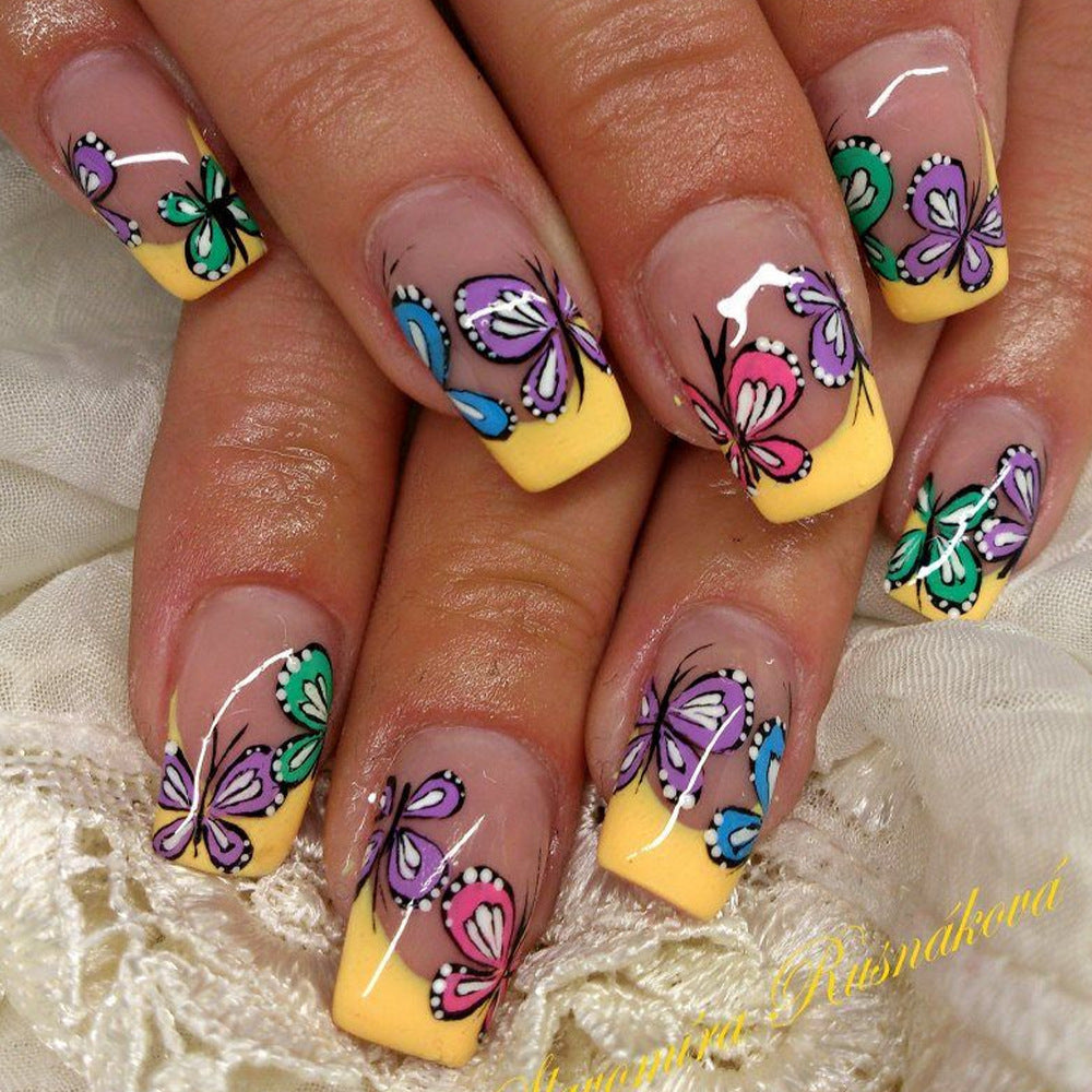 Nail set with intricate butterfly design Bowlift
