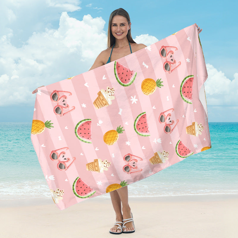 Beach towel with tropical leaf design Bowlift
