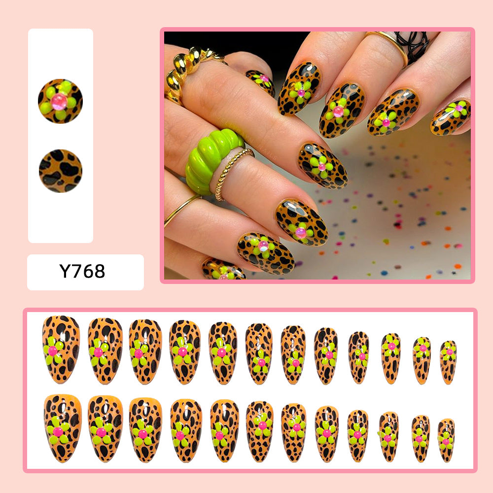 Artificial nails in modern animal patterns with floral accents Bowlift