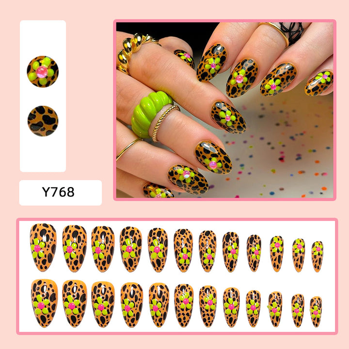 Artificial nails in modern animal patterns with floral accents Bowlift