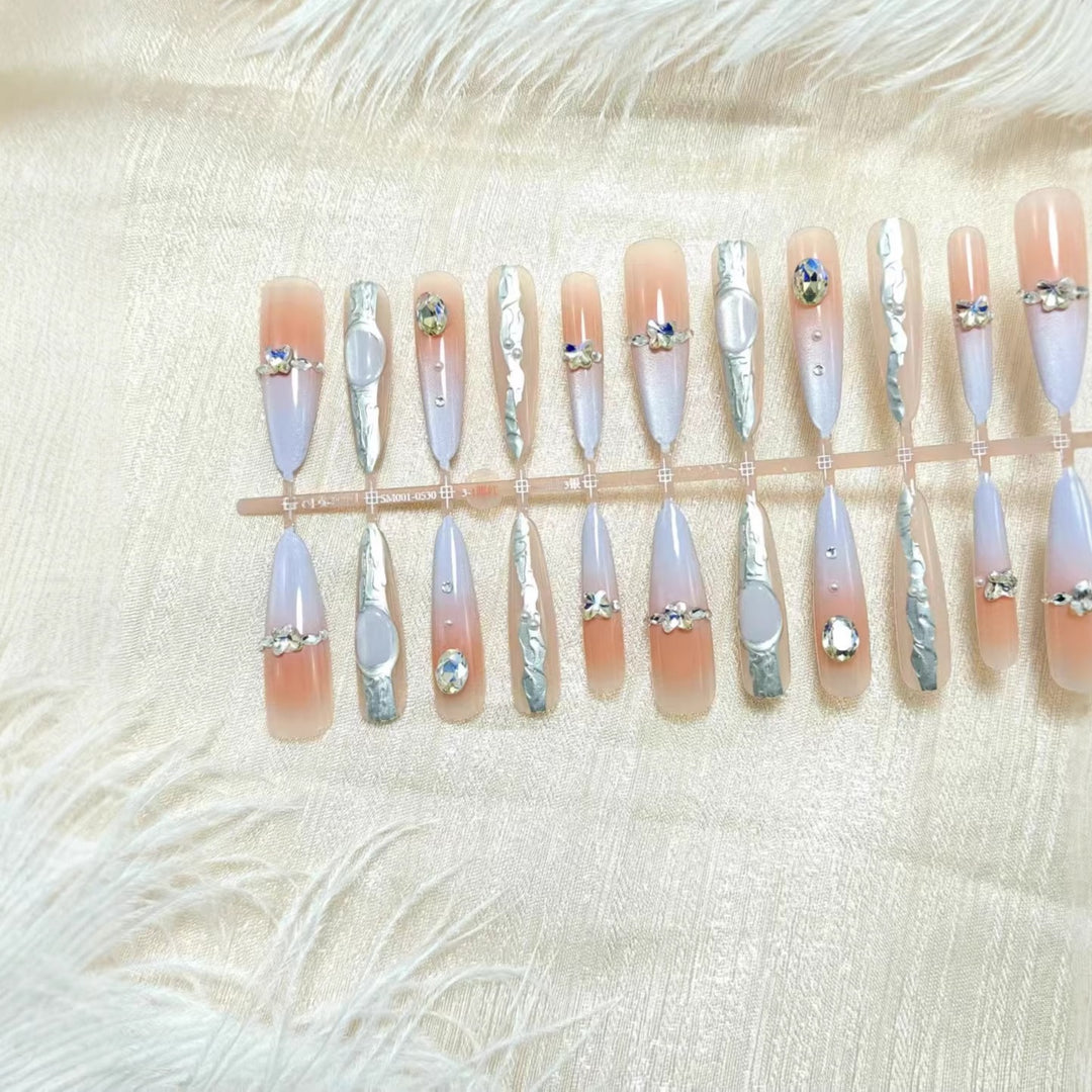 Artificial nails with elegant glitter and crystal accents Bowlift